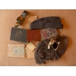 A LEATHER HELMET, TWO PAIRS OF GOGGLES, AIRMANS GUIDE, RAF CAP ETC