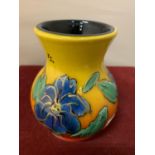 AN ANITA HARRIS HAND PAINTED AND SIGNED BLUE FLOWERS VASE