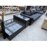 A MODERN BLACK ASH EFFECT LOUNGE TABLE AND TWO SMALLER MATCHING TABLES