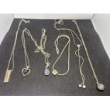 SIX SILVER NECKLACES WITH VARIOUS PENDANTS