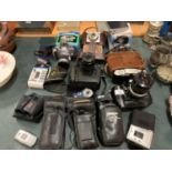 A LARGE ASSORTMENT OF CAMERA EQUIPMENT TO INCLUDE A NIKON F4 AND A NIKON D1 ETC