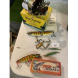 AN ASSORTMENT OF VINTAGE ANGLING ITEMS TO INCLUDE A DAM SPINNER, FLOATS AND A SALT WATER TROLLING