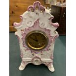 A DECORATIVE CERAMIC MANTEL CLOCK