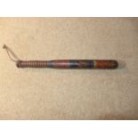 A VICTORIAN HARDWOOD TRUNCHEON, LENGTH 38.5CM, WITH PAINTED DECORATION OF QUEEN VICTORIAS CYPHER AND