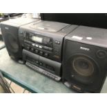 A SONY STEREO SYSTEM WITH CD AND TAPE PLAYER