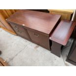 AN INLAID MAHOGANY MAGAZINE RACK TABLE AND A MAHOGANY EFFECT CABINET WITH ONE DOOR AND TWO DRAWERS