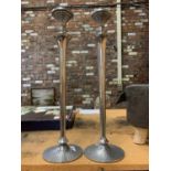 A PAIR OF LARGE DECORATIVE CANDLESTICKS