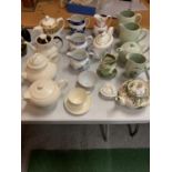 A LARGE ASSORTMENT OF COPELAND SPODE TEAPOTS AND JUGS TO INCLUDE ROYAL DOULTON EXAMPLES