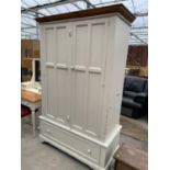 A MODERN PINE AND PAINTED TWO DOOR WARDROBE WITH DRAWER TO THE BASE, 51" WIDE