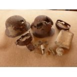 A COLLECTION OF WORLD WAR I RELICS, TO INCLUDE TWO GERMAN HELMETS, WATER BOTTLE ETC, REPUTEDLY FOUND