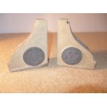 A PAIR OF STONE BOOKENDS, EACH BOOKEND WITH LEAD PLAQUE STATING "THIS STONE CAME FROM THE HOUSES