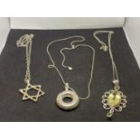 THREE SILVER NECKLACES WITH PENDANTS