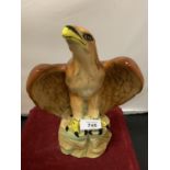 A CERAMIC EAGLE ORNAMENT (A/F)