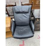 AN IKEA LEATHER EFFECT SWIVEL RECLINER