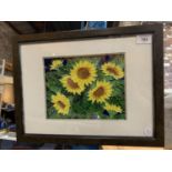 A FRAMED SUNFLOWER PLAQUE