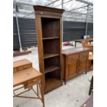 A GEORGE III STYLE OAK OPEN FOUR TIER CORNER BOOKCASE