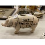 A CAST BUTCHERS PIG MONEY BOX