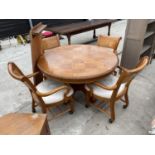 A MODERN CIRCULAR EXTENDING DINING TABLE (DIAMETER 48", LEAF 20") AND FOR FOUR CARVER DINING CHAIRS