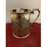 A HEAVILY ENGRAVED SILVER PLATE HALF PINT TANKARD - QUEEN'S HOTEL HANLEY 1881