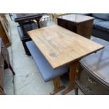 A MODERN PINE KITCHEN TABLE AND TWO BENCHES