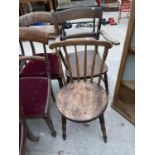 A SPINDLE BACK DINING CHAIR AND AN ELM SEATED ARMCHAIR