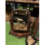 A MAHOGANY DRESSING TABLE MIRROR WITH FINIAL TOPS (FRAME A/F)