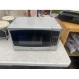 A LOGIK MICROWAVE OVEN BELIEVED IN WORKING ORDER BUT NO WARRANTY