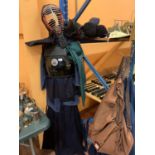 AN ORIGINAL KENDO MARTIAL ARTS UNIFORM TO INCLUDE HELMET AND PADS ETC