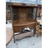 AN UNUSUAL ART NOUVEAU BOW FRONTED INLAID OAK CHIFFONIER WITH TWO LOWER DOORS AND DRAWER AND UPPER