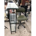 AN OFFICE SWIVEL CHAIR AND A GLASS AND METAL SHELVING UNIT
