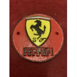 A CAST METAL "FERRARI" CIRCULAR SIGN