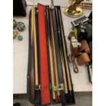 THREE FULL SIZE SNOOKER CUES WITH CUSTOM CASES
