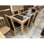 A MODERN DINING TABLE 56x31" WITH INSET GRANITE TOP, TOGETHER WITH SIX CHAIRS