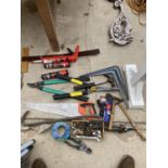 A LARGE ASSORTMENT OF HAND TOOLS TO INCLUDE HAMMER, SAW AND SPANNER ETC