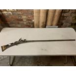 A SNAPHAUNCE LATE 17TH/EARLY 18TH CENTURY IVORY STOCK SILVERED MUSKET BARREL L:111CM