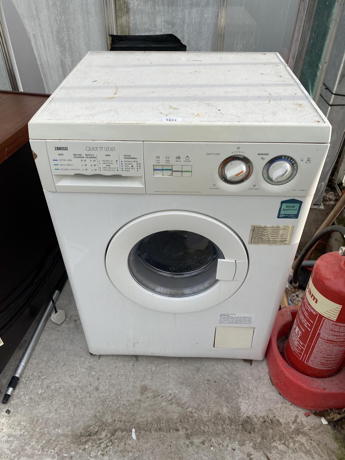 A WHITE ZANUSSI WASHING MACHINE BELIEVED IN WORKING ORDER BUT NO WARRANTY