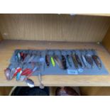 AN ASSORTMENT OF FISHING BAIT HOOKS