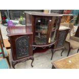 A VICTROIAN MAHOGANY TWO DOOR BOWFRONT DISPLAY CABINET FLANKED BY TWO CUPBOARD DOORS BEARING MUSICAL