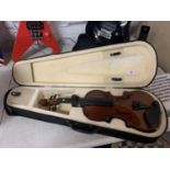 A CASED HALF VIOLIN