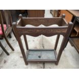 AN EARLY 20TH CENTURY OAK UMBRELLA STAND