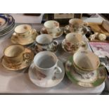 A COLLECTION OF EIGHT EARLY CERAMIC JUMBO CUPS AND SAUCERS