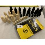 A TEACH YOURSELF CHESS BOOK BY GERALD ABRAHAMS AND A SET OF BLACK & WHITE CHESS PIECES