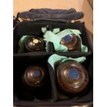 A VINTAGE CASED SET OF CROWN GREEN BOWLS TAYLORS