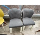 A PAIR OF MODERN GREY UPHOLSTERED BEDROOM CHAIRS