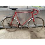 A VINTAGE HENRY BURTON ROAD RACING BIKE WITH 12 GEARS