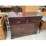 A VICTORIAN STAINED PINE CHEST OF TWO SHORT AND TWO LONG DRAWERS