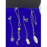 FOUR ASSORTED SILVER NECKLACES WITH PENDANTS TO INCLUDE A ST CHRISTOPHER, K ETC