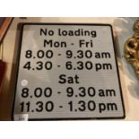 A "NO LOADING" SIGN