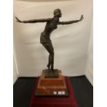 AN ART DECO BRONZE CHARLESTON DANCING FIGURE MOUNTED ON A MARBLE PLINTH AND SIGNED D H CHIPARUS