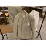 A ROYAL TANK REGIMENT TROPICAL UNIFORM COMPRISING JACKET AND TROUSERS, WHITE MESS JACKET AND A